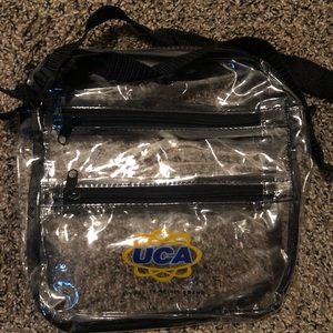 UCA clear bag with adjustable strap.